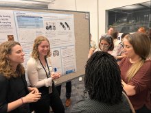 Grace Stohr presenting a poster at NIH Postbac Poster Day