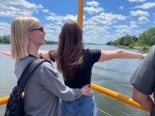 Clara and Cassie doing a pose from the movie Titanic on a water taxi on the Potomac river. 